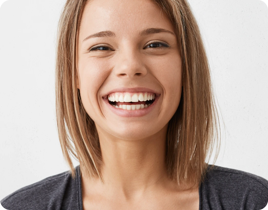 Close-up smile result for smile makeover by a cosmetic dentist at Mona Vale Dental, Sydney area
